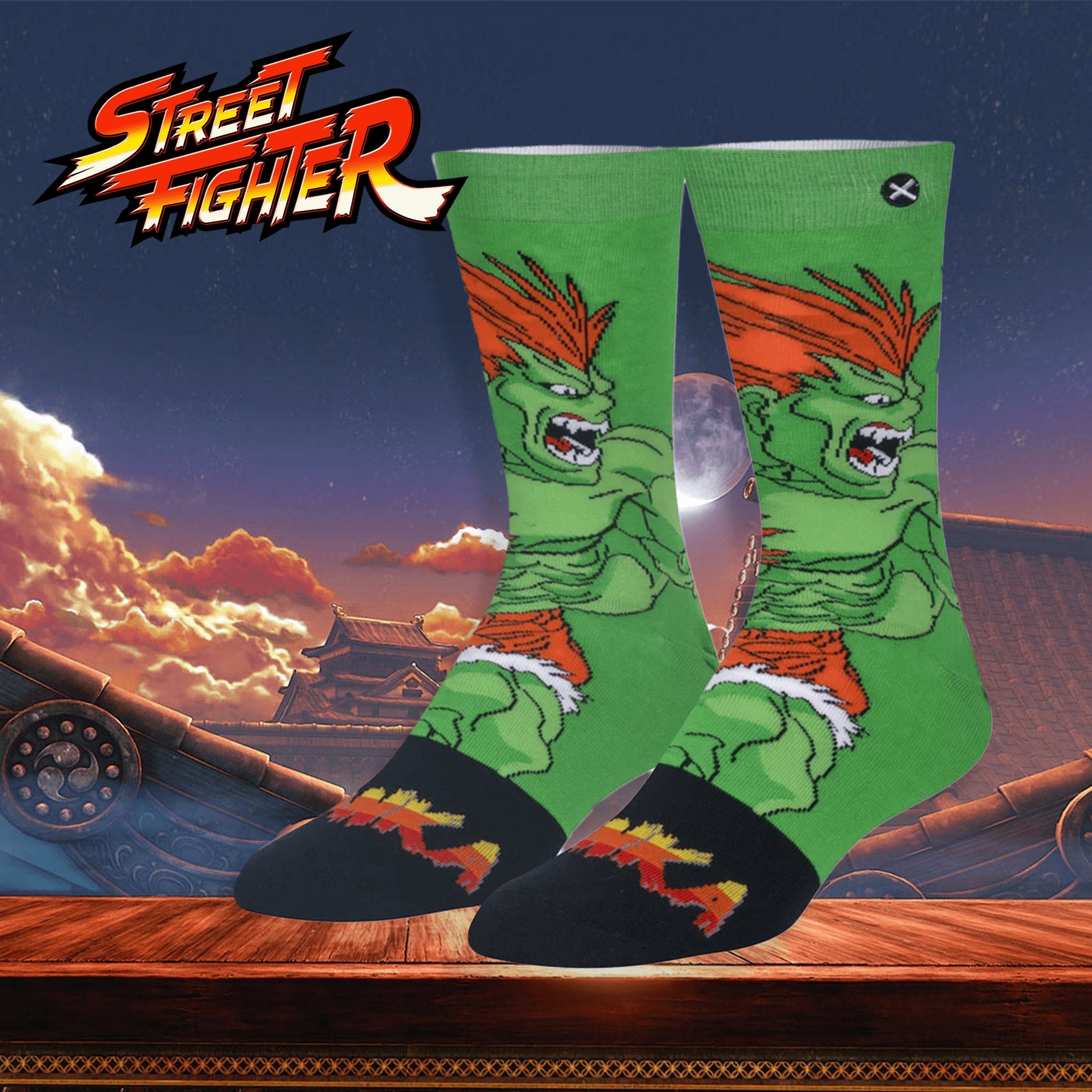Green and black socks featuring Blanka from Street Fighter with a dramatic action-packed background.