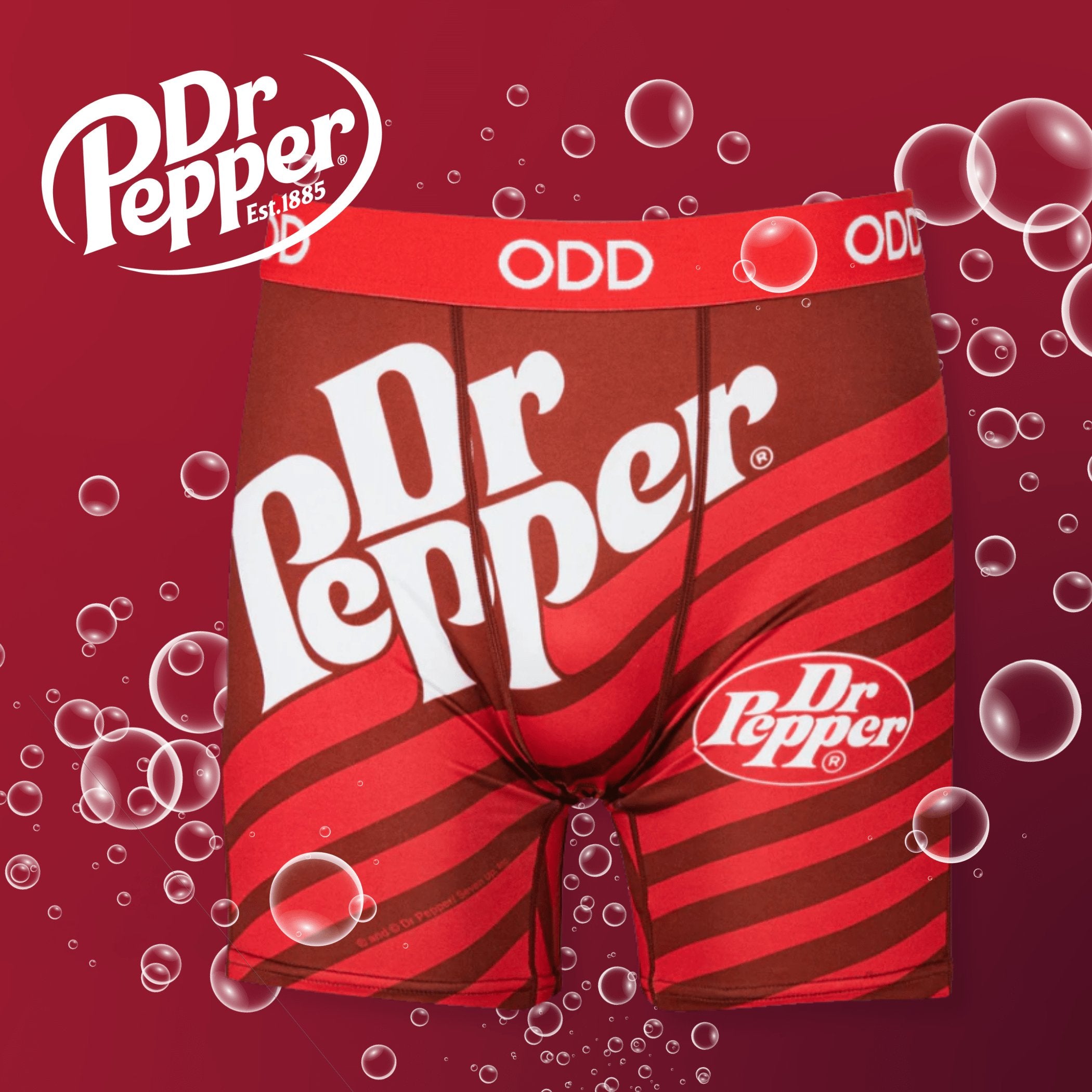 Boxer briefs with a Dr Pepper design featuring red stripes on a maroon background with bubble graphics.
