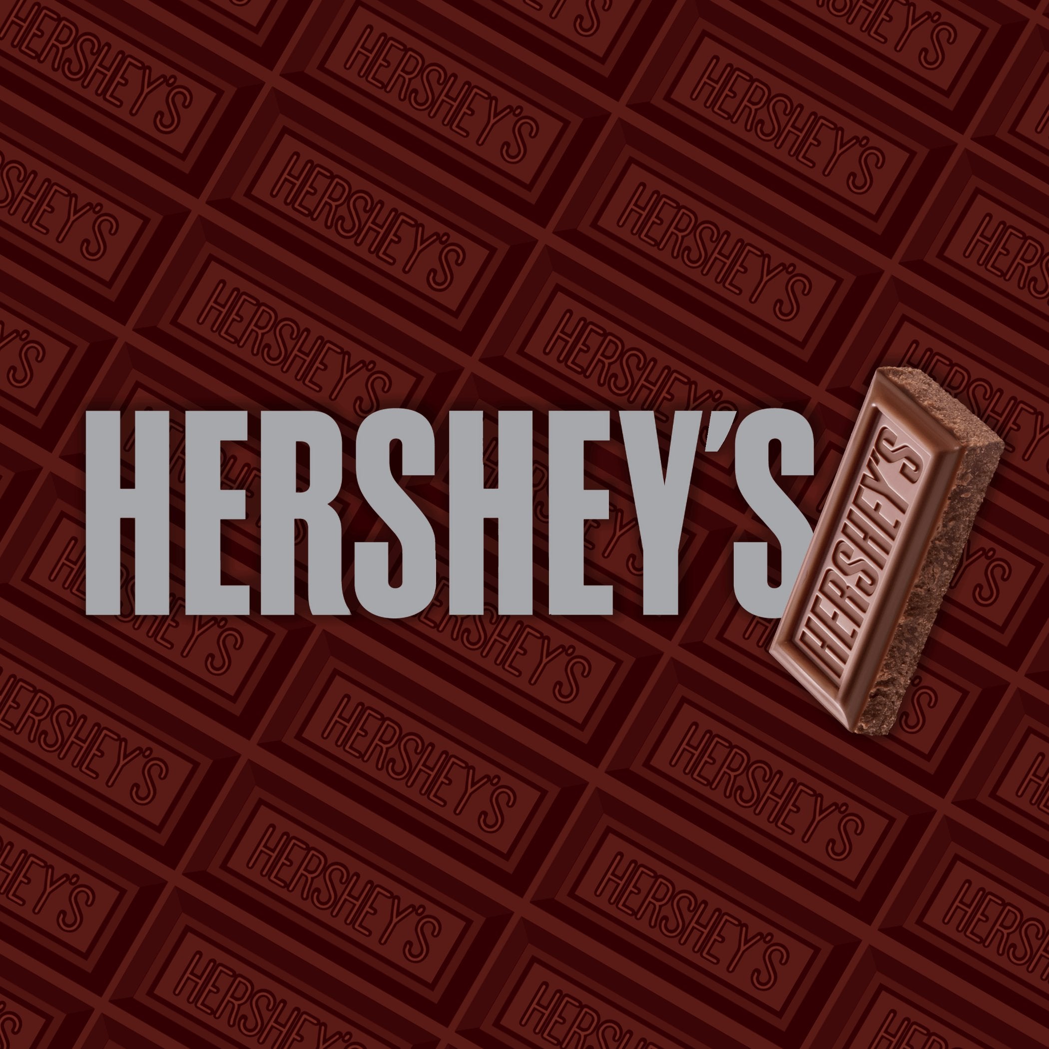 Deep brown background with embossed Hershey's chocolate bar patterns and bold silver Hershey's logo.