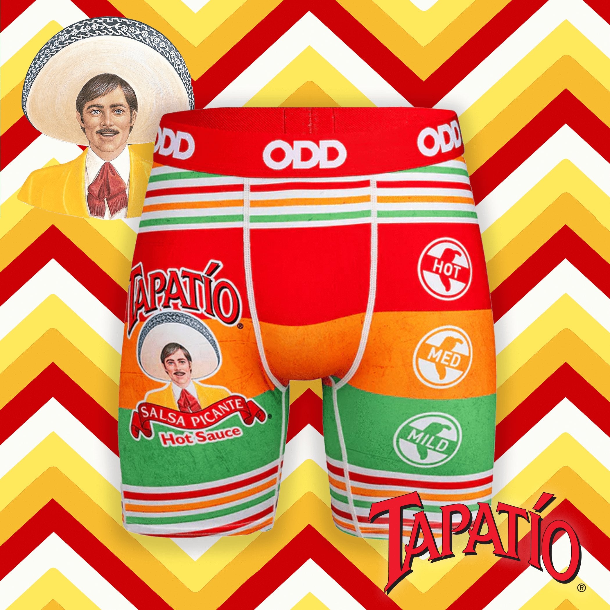 Bright red and green boxer shorts with the Tapatío logo, salsa spice levels, and vibrant stripes evoking a hot sauce theme.