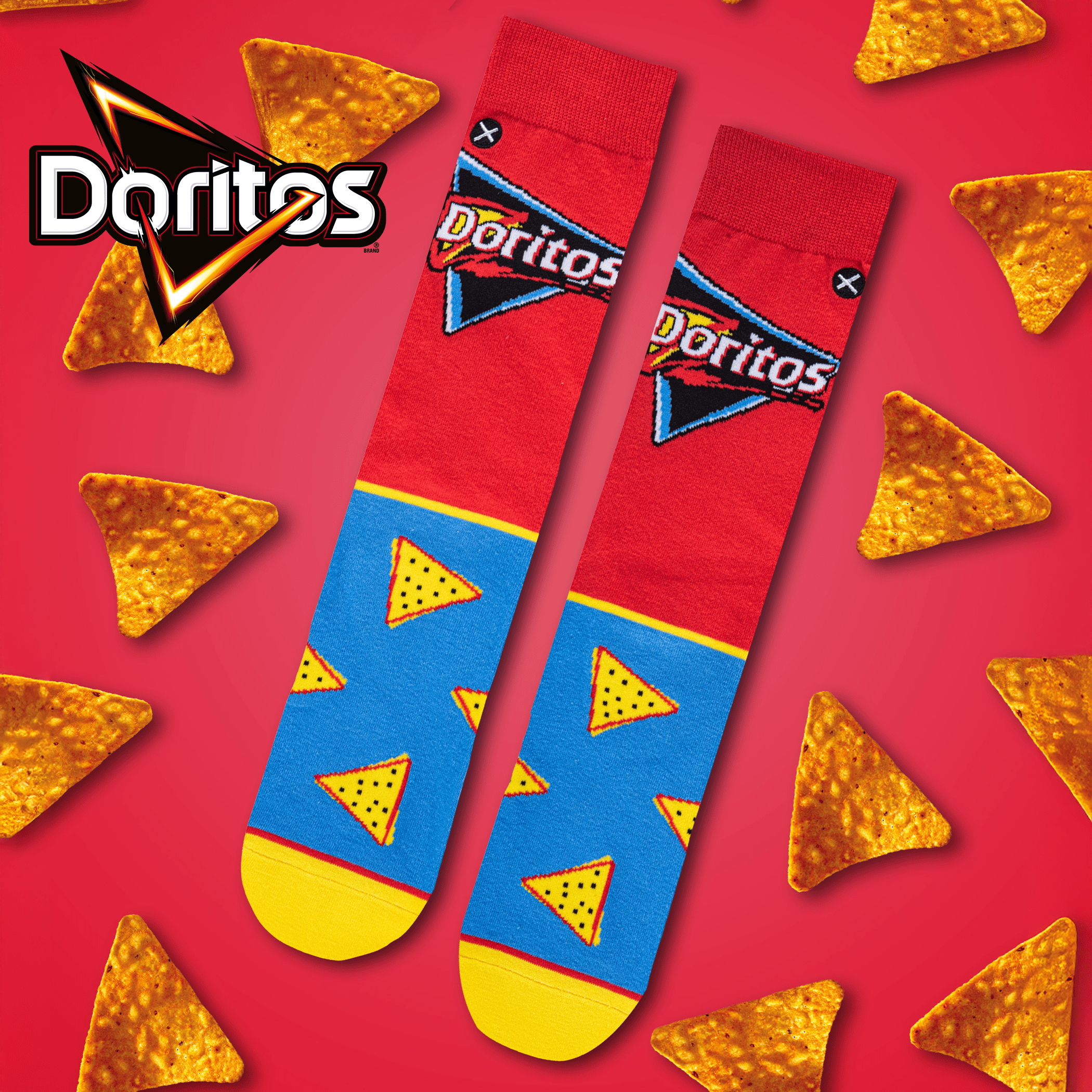 Bold red background with Doritos socks decorated with triangle chip patterns, highlighting the cheesy, crunchy feel of the snack.