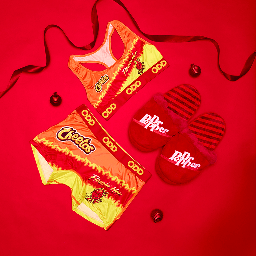 Cheetos and Dr Pepper themed underwear set on a red background