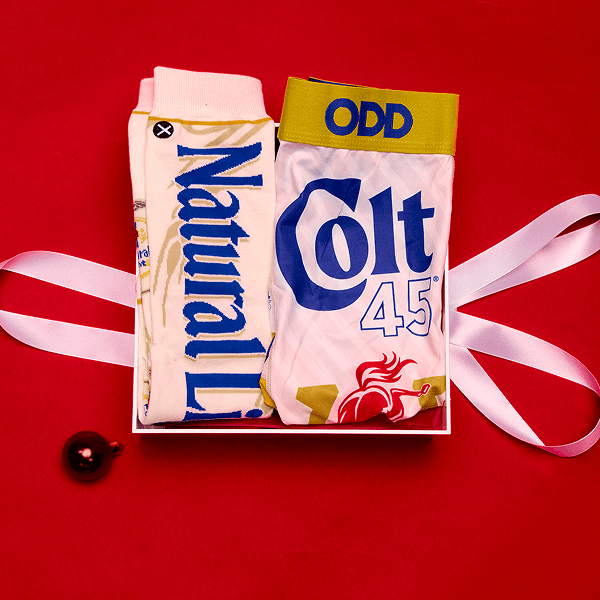 Two pairs of underwear labeled 'Natural' and 'Colt 45' on a red background with ribbons.