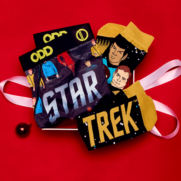 Star Trek-themed products including socks and a hat on a red background