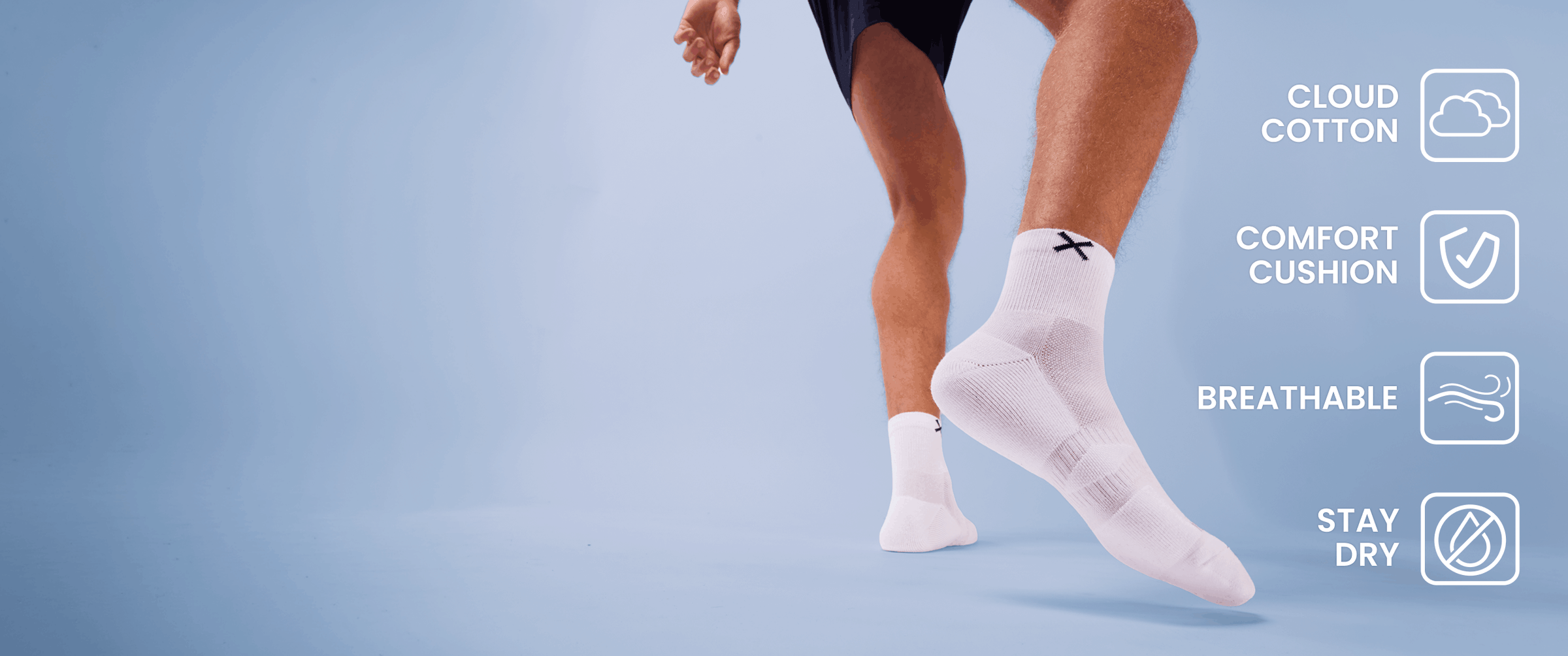 Person wearing white socks with text on cloud background