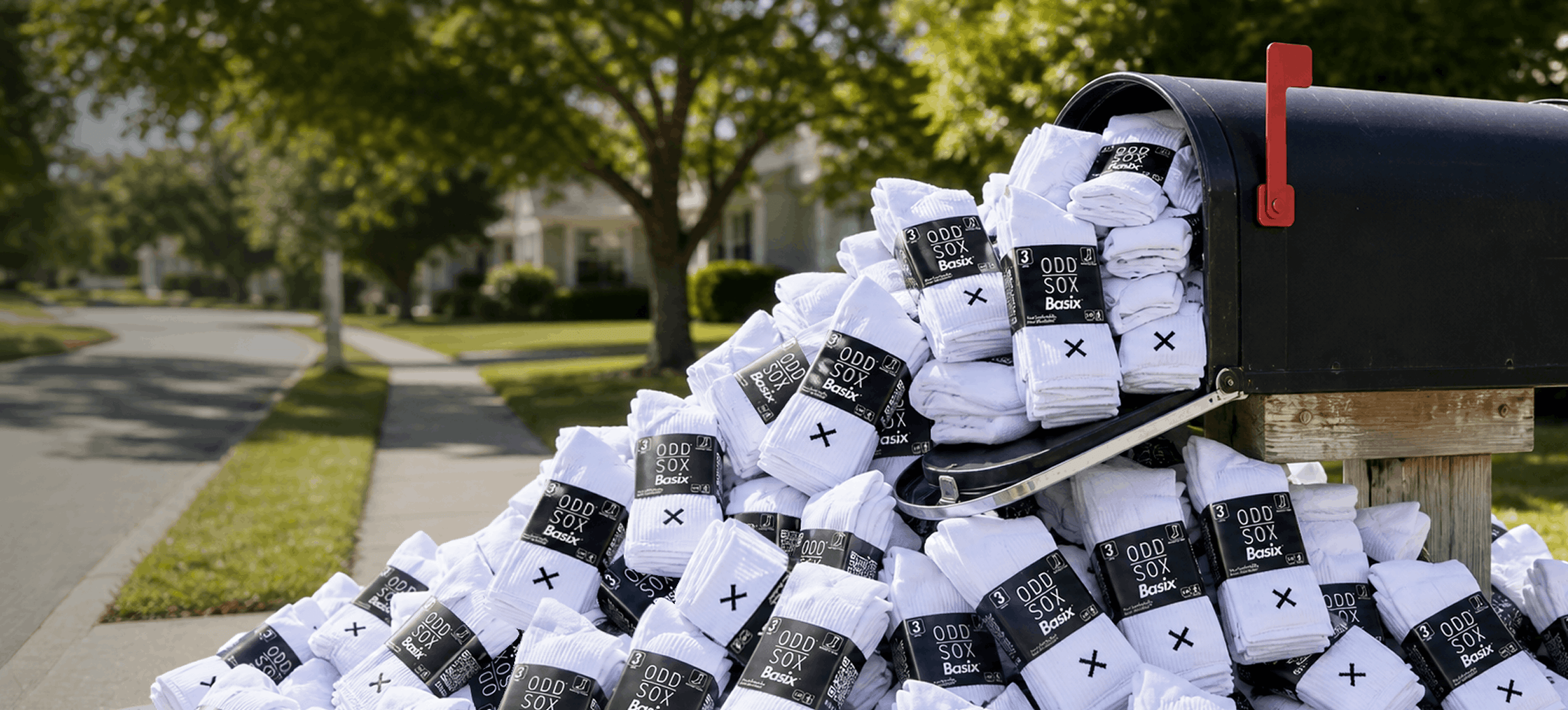 Mailbox filled with white socks with black labels outdoors
