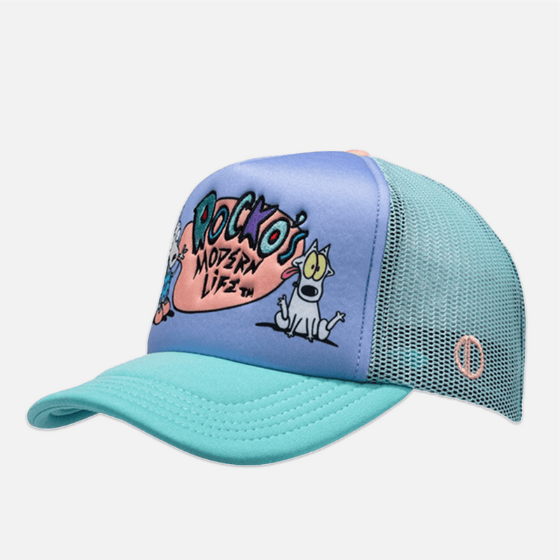 Blue and turquoise cap with cartoon design on a white background