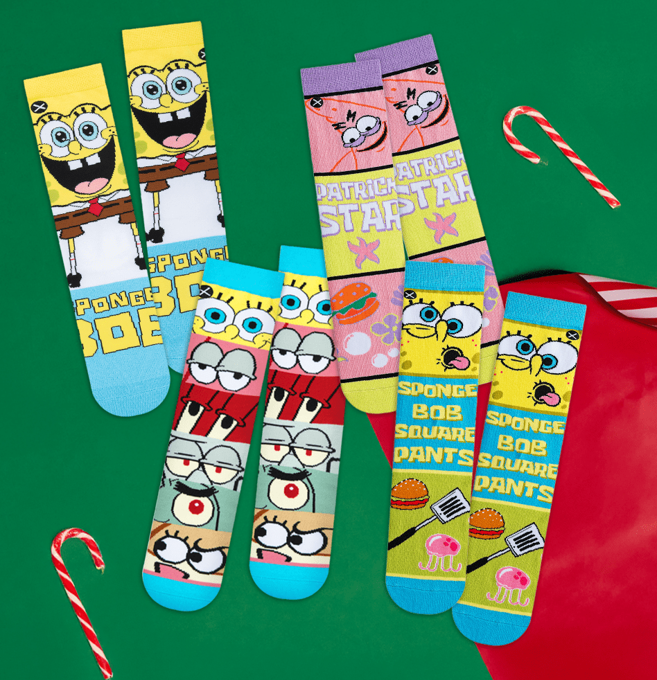 Colorful SpongeBob SquarePants socks on a green background with candy canes.